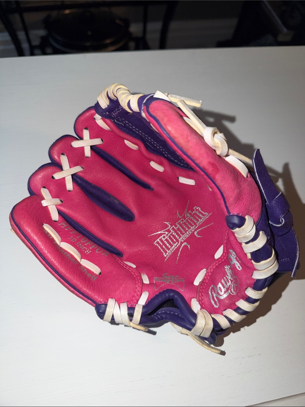 Rawlings Purple and Pink Youth Softball Glove with White Lacing left hand